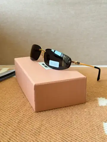 Miu Miu Sunglasses Black in Dubai